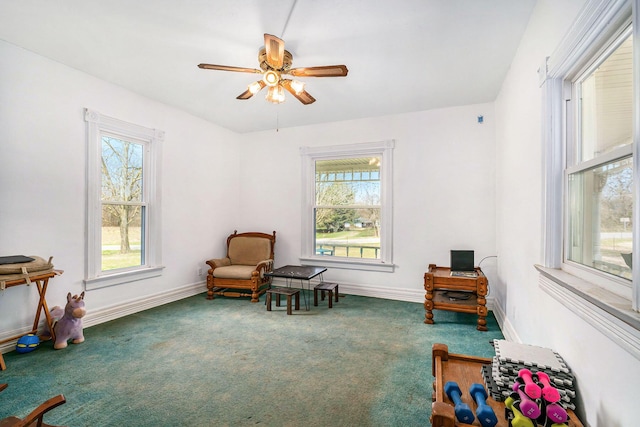 2640 Terminal St, Niles, MI 49120 - sitting room featuring carpet, healthy amount of natural light, a ceiling fan, and baseboards