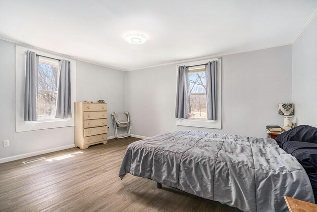 2640 Terminal St, Niles, MI 49120 - bedroom featuring crown molding, wood finished floors, baseboards, and multiple windows