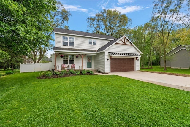 view of front of property with covered porch, driveway, and an attached garage