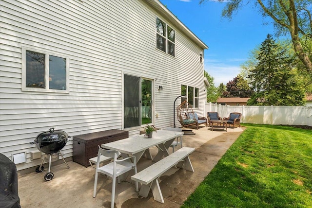 view of patio featuring a grill