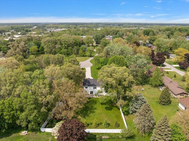 aerial overview of property's location with a forest