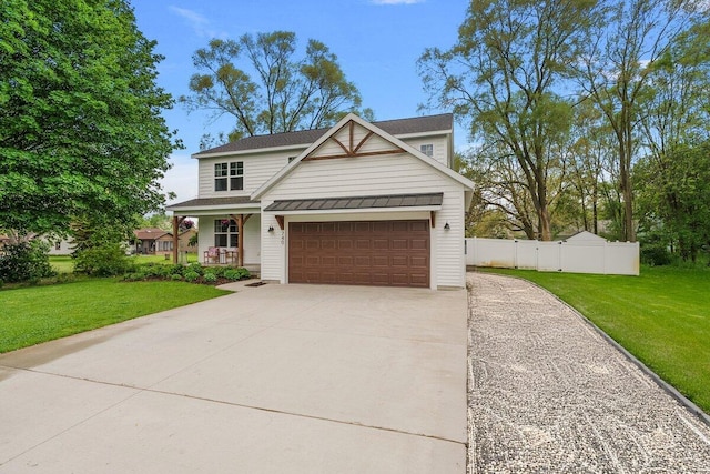 view of front facade featuring covered porch and concrete driveway
