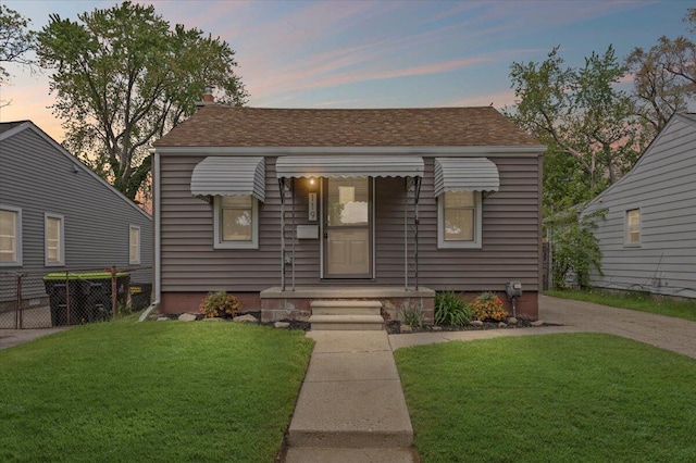 view of front facade featuring a shingled roof