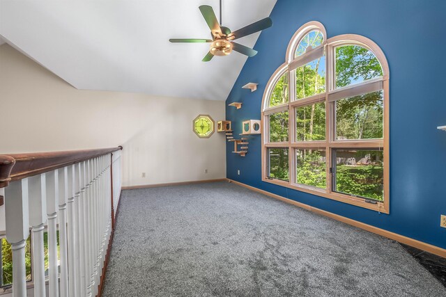 586 Schaeffer Dr, Coldwater, MI 49036 - carpeted empty room featuring a ceiling fan, baseboards, and high vaulted ceiling