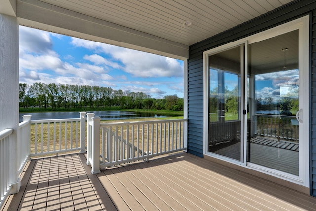 9156 Perry Ct Lot C, Lot C, Zeeland, MI 49464 - wooden terrace featuring a water view and view of scattered trees