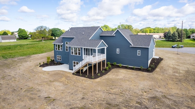 9156 Perry Ct Lot C, Lot C, Zeeland, MI 49464 - back of house featuring roof with shingles, a wooden deck, and stairs