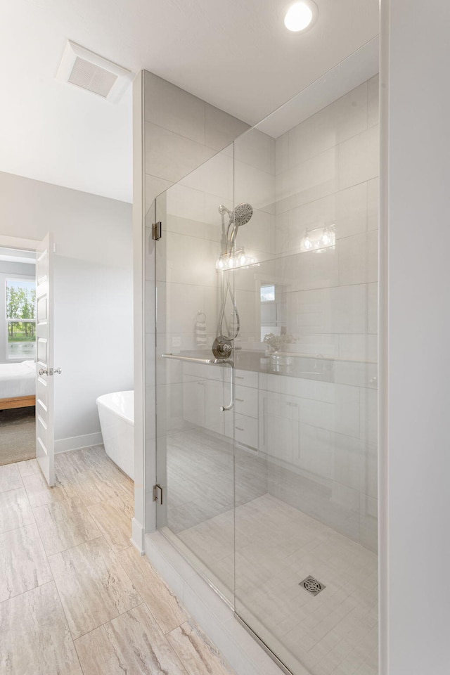 9156 Perry Ct Lot C, Lot C, Zeeland, MI 49464 - full bathroom featuring a soaking tub, a stall shower, and ensuite bath