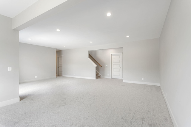 9156 Perry Ct Lot C, Lot C, Zeeland, MI 49464 - unfurnished room with stairway, light carpet, recessed lighting, and baseboards