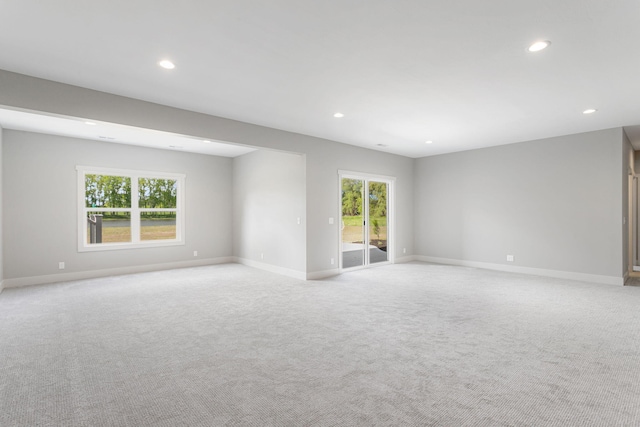 9156 Perry Ct Lot C, Lot C, Zeeland, MI 49464 - spare room featuring recessed lighting, light carpet, baseboards, and plenty of natural light