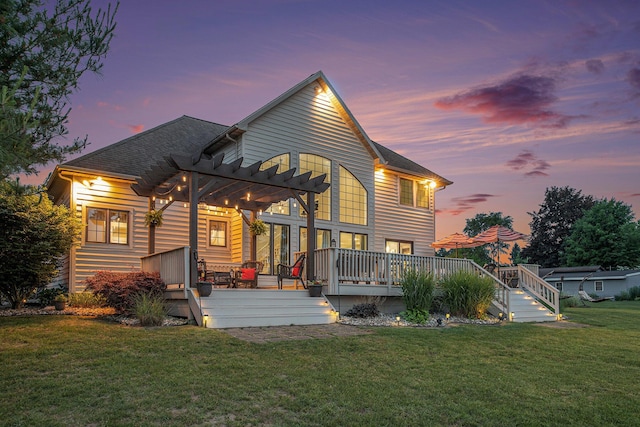 1256 Barron Lake Rd, Niles, MI 49120 - back of property at dusk with a pergola, a wooden deck, and a yard