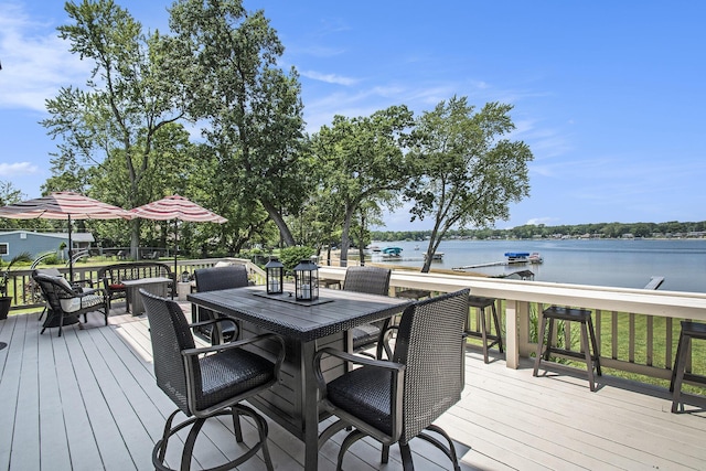 1256 Barron Lake Rd, Niles, MI 49120 - wooden deck featuring a water view and outdoor dining area