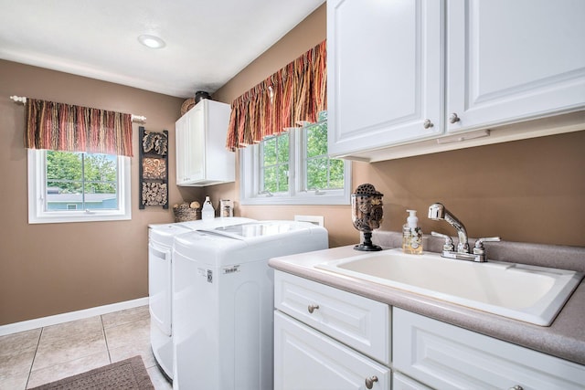 1256 Barron Lake Rd, Niles, MI 49120 - laundry room featuring cabinet space, washing machine and clothes dryer, and light tile patterned floors