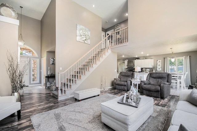 1256 Barron Lake Rd, Niles, MI 49120 - living area with a high ceiling, wood finished floors, stairway, and recessed lighting