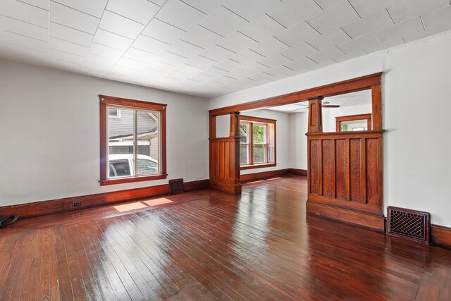 604 Edgewood St, Jackson, MI 49202 - empty room with hardwood / wood-style flooring and baseboards