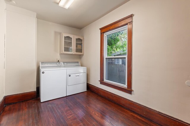 604 Edgewood St, Jackson, MI 49202 - laundry room featuring separate washer and dryer, dark wood-style floors, and baseboards