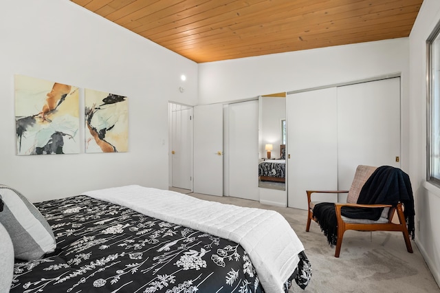 520 N W St, Coloma, MI 49038 - bedroom with wooden ceiling, light colored carpet, and multiple closets