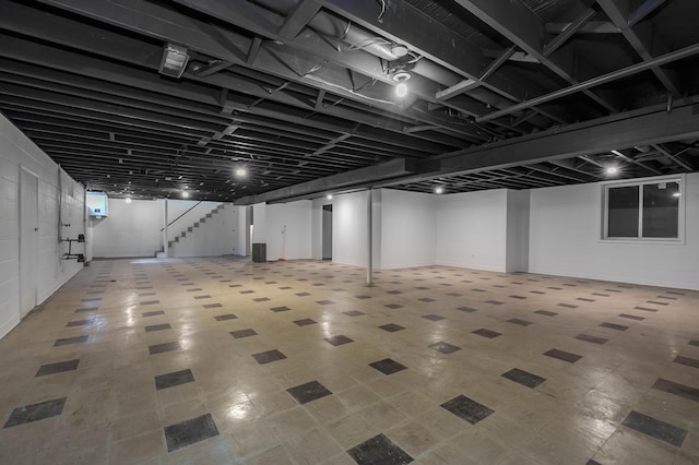 520 N W St, Coloma, MI 49038 - finished basement with tile patterned floors and stairs