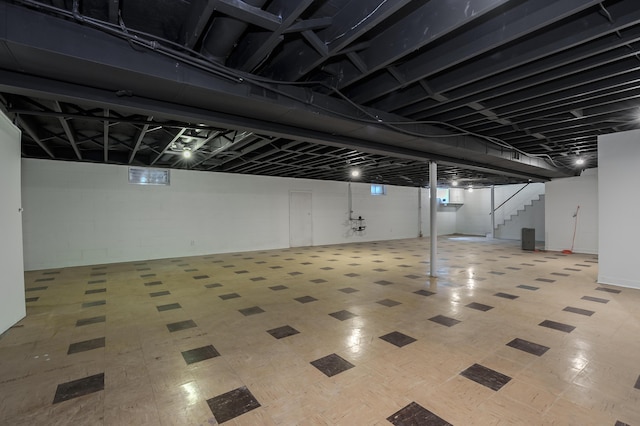 520 N W St, Coloma, MI 49038 - finished below grade area featuring stairs and tile patterned floors