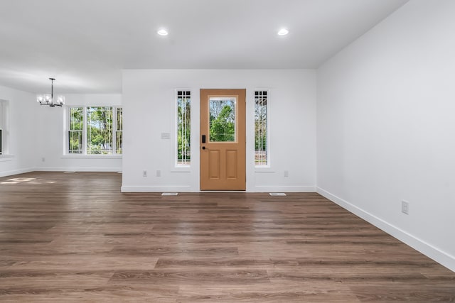 611 River Rd, Marshall, MI 49068 - entryway with a chandelier, baseboards, recessed lighting, and wood finished floors