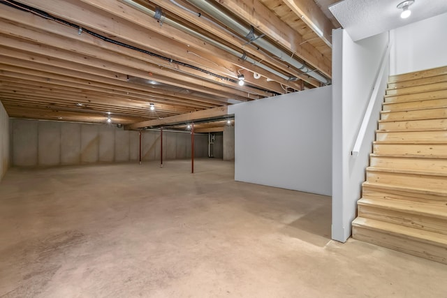 611 River Rd, Marshall, MI 49068 - finished below grade area featuring stairs