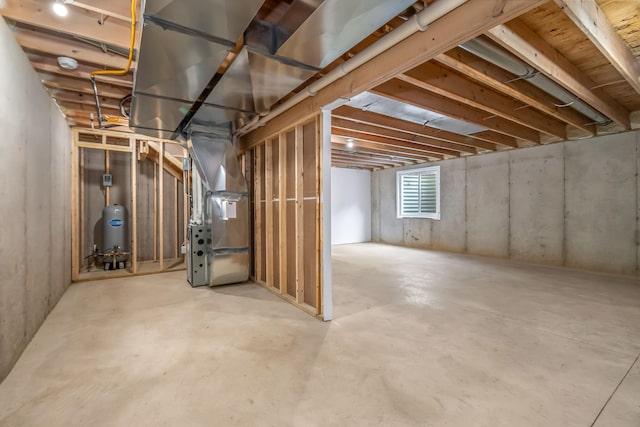 611 River Rd, Marshall, MI 49068 - below grade area with a water pressure tank and heating unit