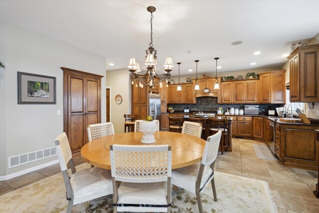 1259 Rose Dr, Niles, MI 49120 - dining space with a chandelier, baseboards, and recessed lighting