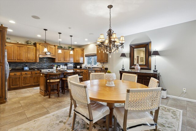 1259 Rose Dr, Niles, MI 49120 - dining room featuring a chandelier, recessed lighting, light tile patterned flooring, and baseboards