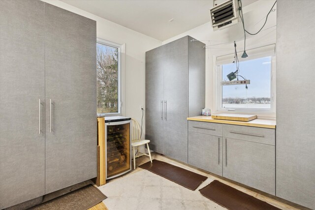 1259 Rose Dr, Niles, MI 49120 - bathroom with beverage cooler, a heating unit, wood finished floors, and vanity