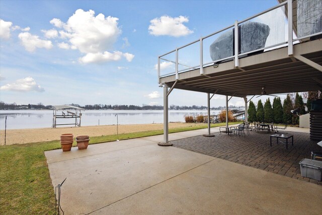1259 Rose Dr, Niles, MI 49120 - view of property's community featuring a patio area, a water view, and a lawn