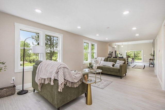 3401 Hicks Ave, Benton Harbor, MI 49022 - living area featuring healthy amount of natural light, recessed lighting, light wood-style flooring, and baseboards