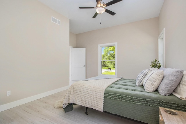 3401 Hicks Ave, Benton Harbor, MI 49022 - bedroom featuring wood finished floors, baseboards, and a ceiling fan