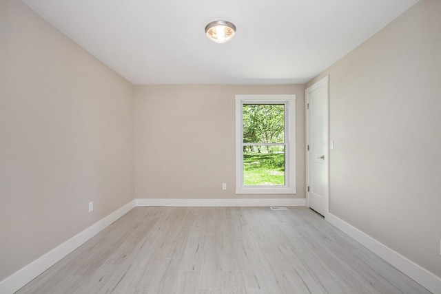 3401 Hicks Ave, Benton Harbor, MI 49022 - unfurnished room with light wood finished floors and baseboards