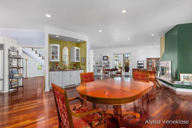404 N Shore Dr, South Haven, MI 49090 - dining room featuring dark wood finished floors, stairway, recessed lighting, and ornamental molding