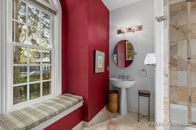 404 N Shore Dr, South Haven, MI 49090 - full bathroom with a sink, baseboards, and shower / washtub combination