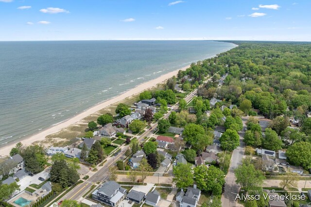 404 N Shore Dr, South Haven, MI 49090 - aerial overview of property's location featuring waterfront with a beach and nearby suburban area