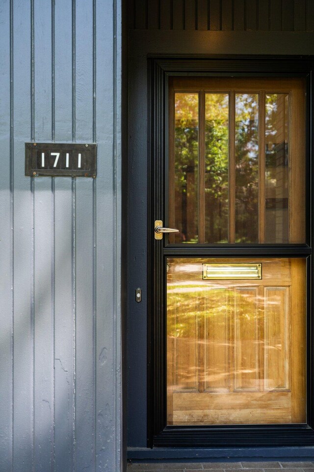1711 Morton Ave, Ann Arbor, MI 48104 - doorway to property with board and batten siding