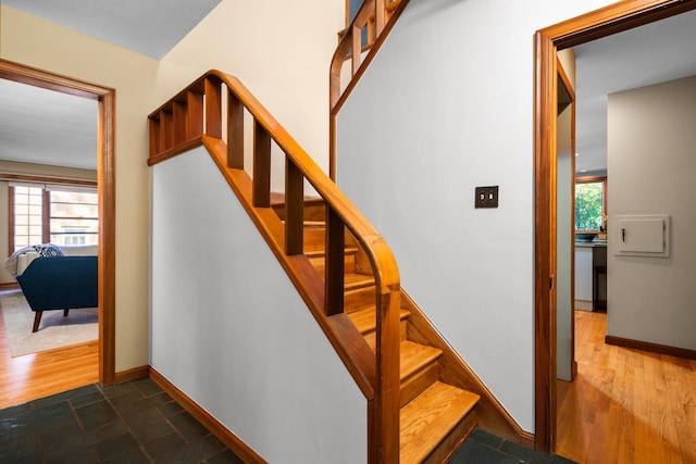 1711 Morton Ave, Ann Arbor, MI 48104 - staircase featuring baseboards and wood finished floors