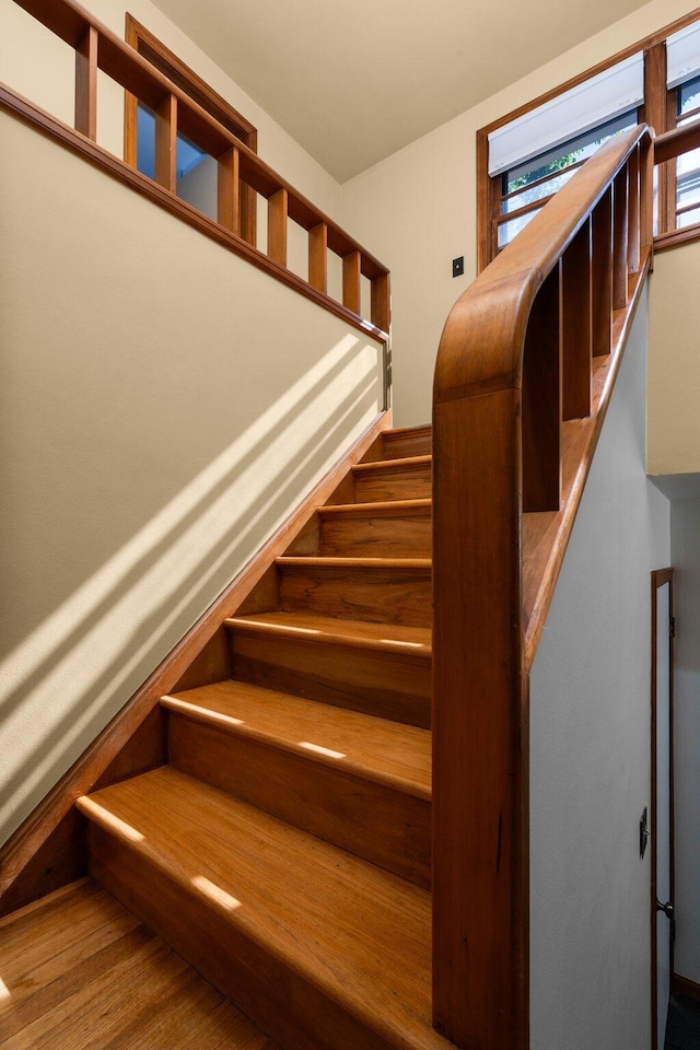 1711 Morton Ave, Ann Arbor, MI 48104 - staircase featuring wood finished floors