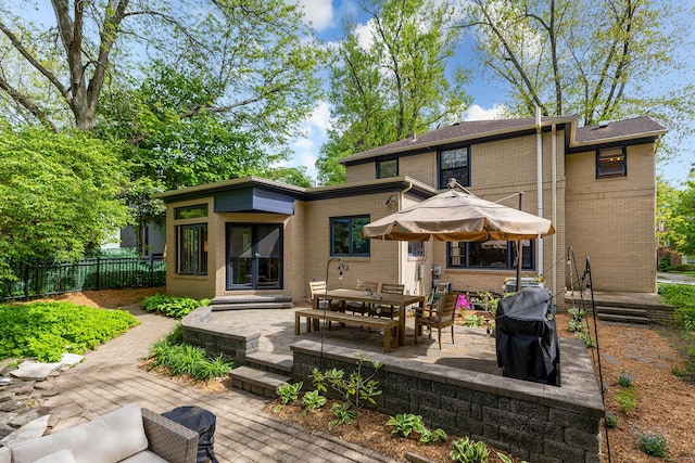 1711 Morton Ave, Ann Arbor, MI 48104 - rear view of house featuring a patio area and brick siding