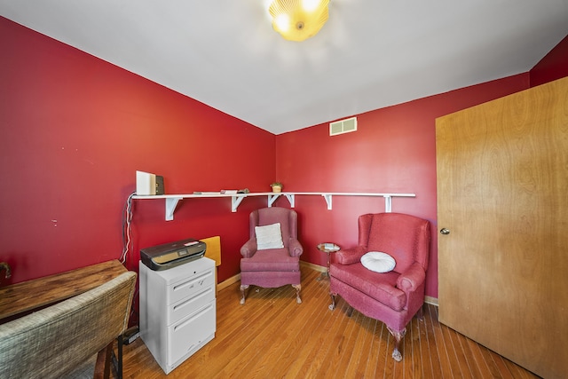 11486 Halsey Rd, Holly, MI 48442 - sitting room featuring wood finished floors and baseboards