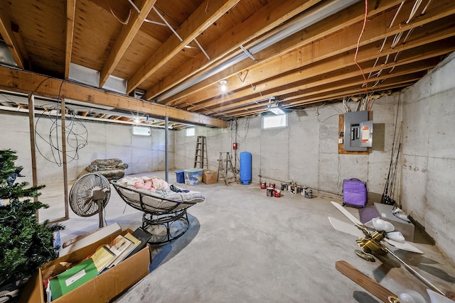11486 Halsey Rd, Holly, MI 48442 - below grade area featuring electric panel and a water pressure tank