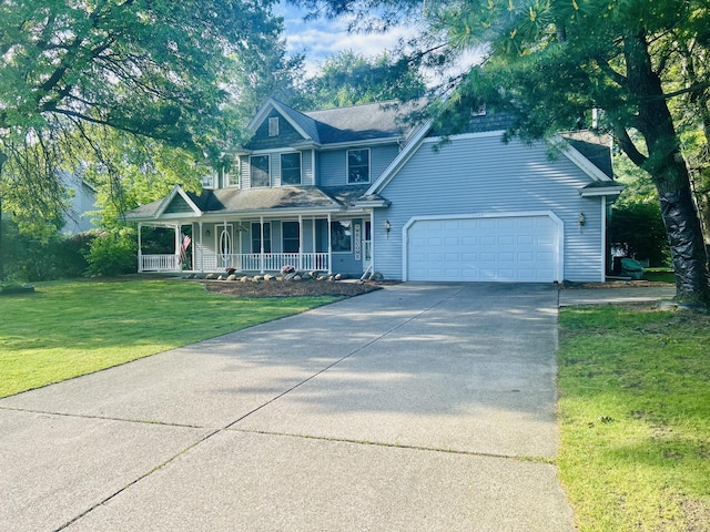 5335 Heathrow Ave, Kalamazoo, MI 49009 - view of front facade with a porch, driveway, a front yard, and an attached garage