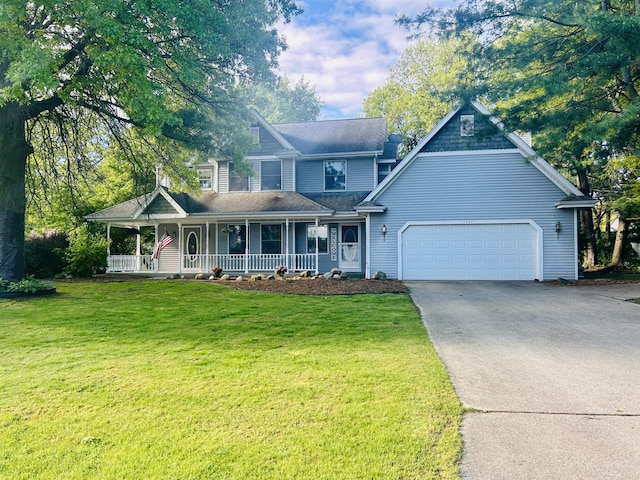 5335 Heathrow Ave, Kalamazoo, MI 49009 - victorian-style house with driveway, a garage, a porch, and a front lawn