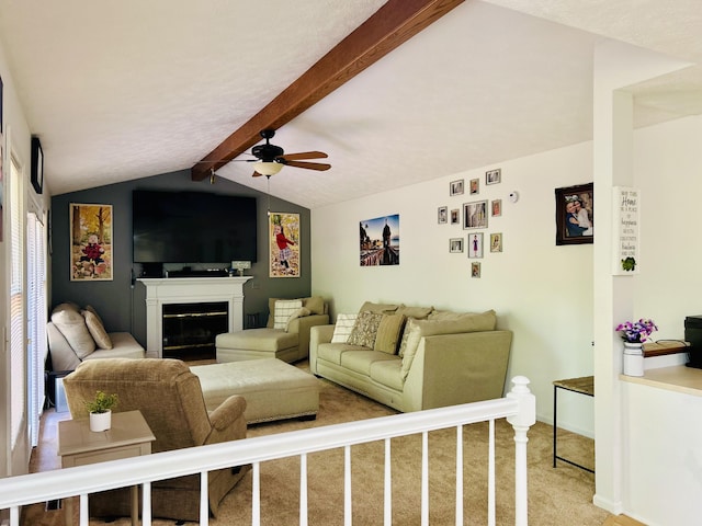5335 Heathrow Ave, Kalamazoo, MI 49009 - living room with ceiling fan, carpet, a glass covered fireplace, and baseboards