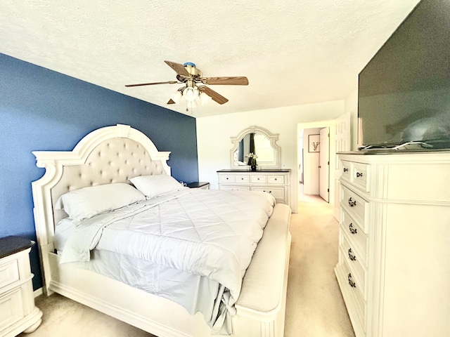 5335 Heathrow Ave, Kalamazoo, MI 49009 - bedroom featuring light carpet, a ceiling fan, and a textured ceiling