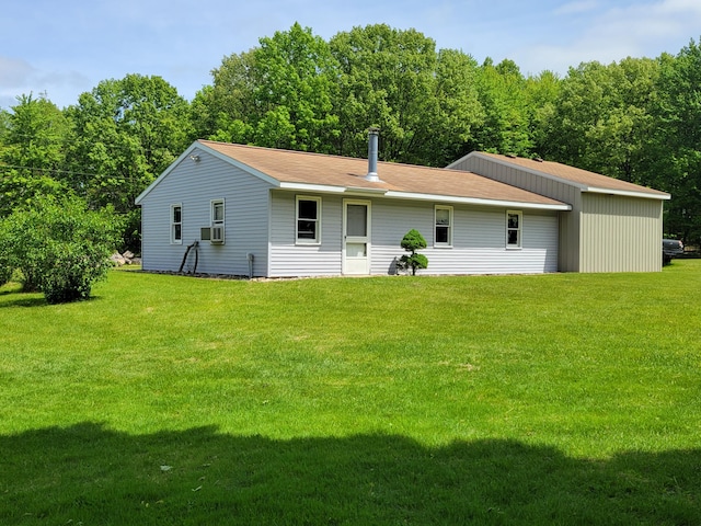 9490 N 12th St, Kalamazoo, MI 49009 - view of front of house with a front yard and cooling unit