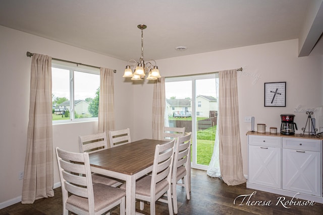 4240 Butternut Dr, Wayland, MI 49348 - dining space with a chandelier and dark wood finished floors