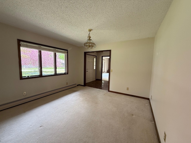 6035 W Trails End Rd, Ludington, MI 49431 - unfurnished room with a baseboard heating unit, light carpet, a textured ceiling, and baseboards