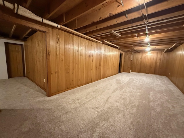 6035 W Trails End Rd, Ludington, MI 49431 - finished basement with carpet and wood walls