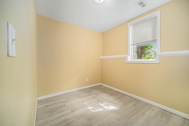550 1st Ave, Ypsilanti, MI 48197 - empty room featuring wood finished floors and baseboards